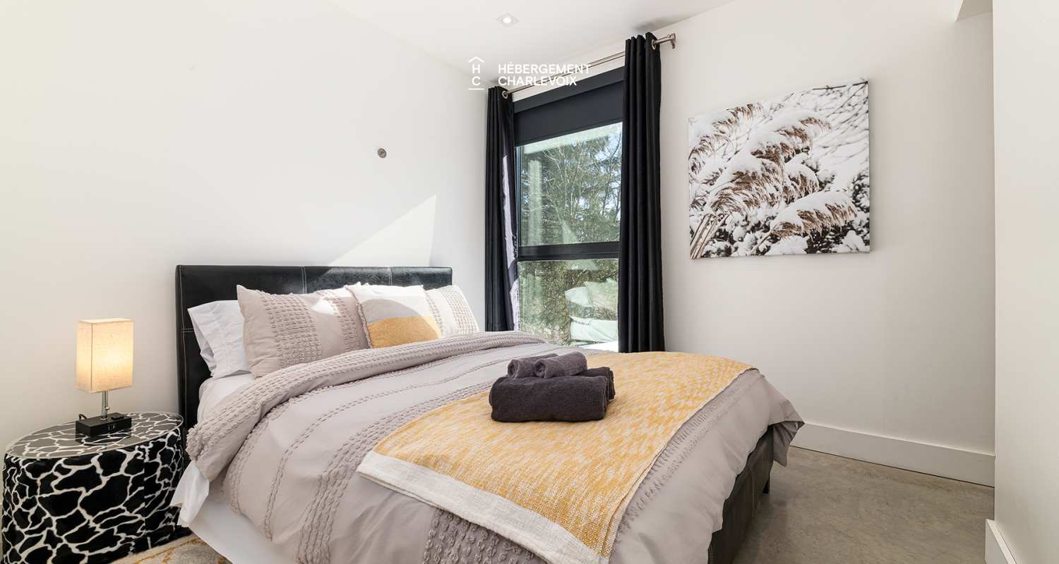 ABS-595 - Un feu de foyer suspendu dans un chalet de luxe à louer dans Charlevoix.