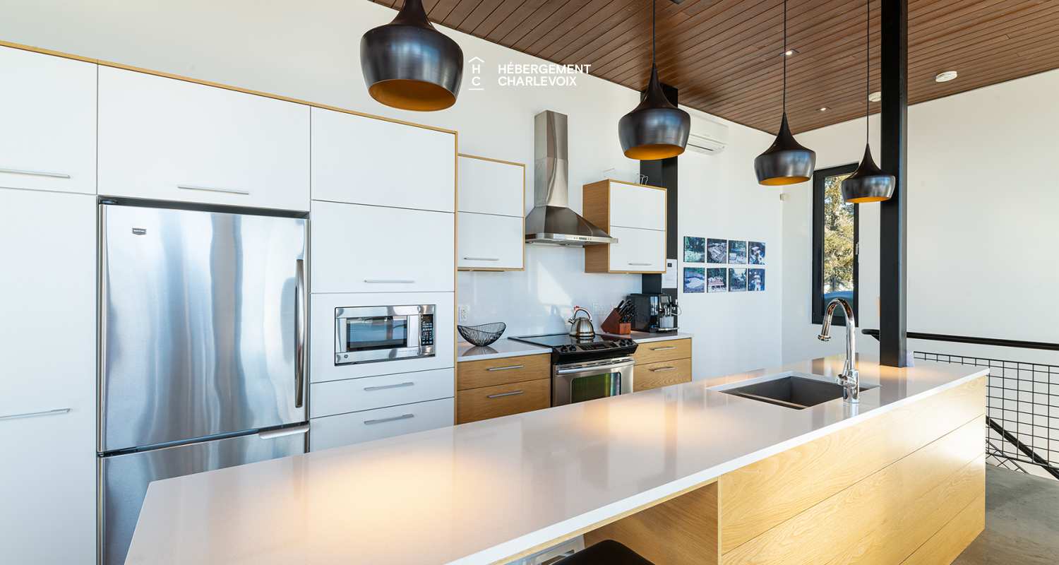 ABS-595 - Un feu de foyer suspendu dans un chalet de luxe à louer dans Charlevoix.