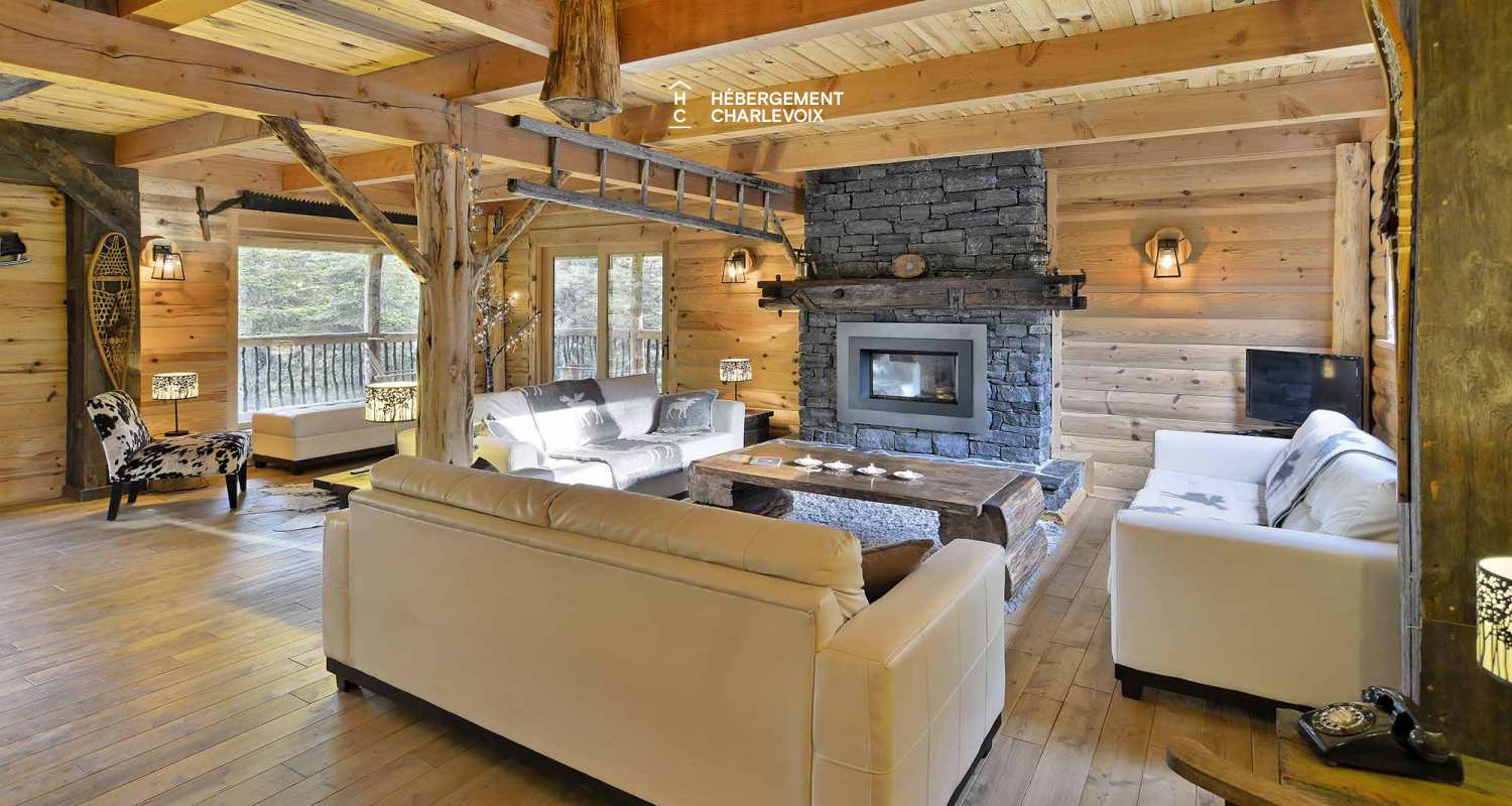 CAB-30 - Très grand chalet en demi-bois rond au coeur de la forêt canadienne.