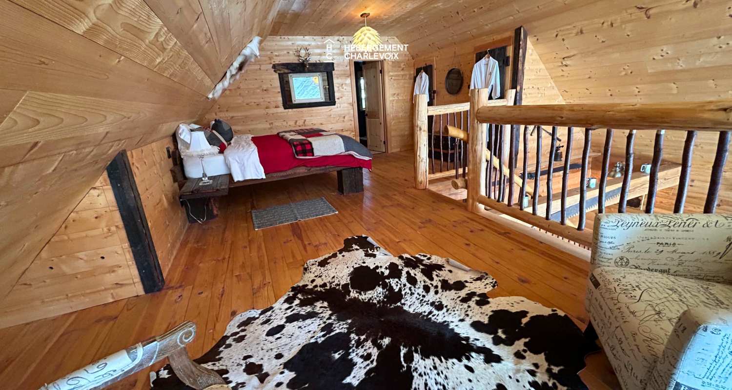 CAB-20 - Très grand chalet en demi-bois rond au coeur de la forêt canadienne.