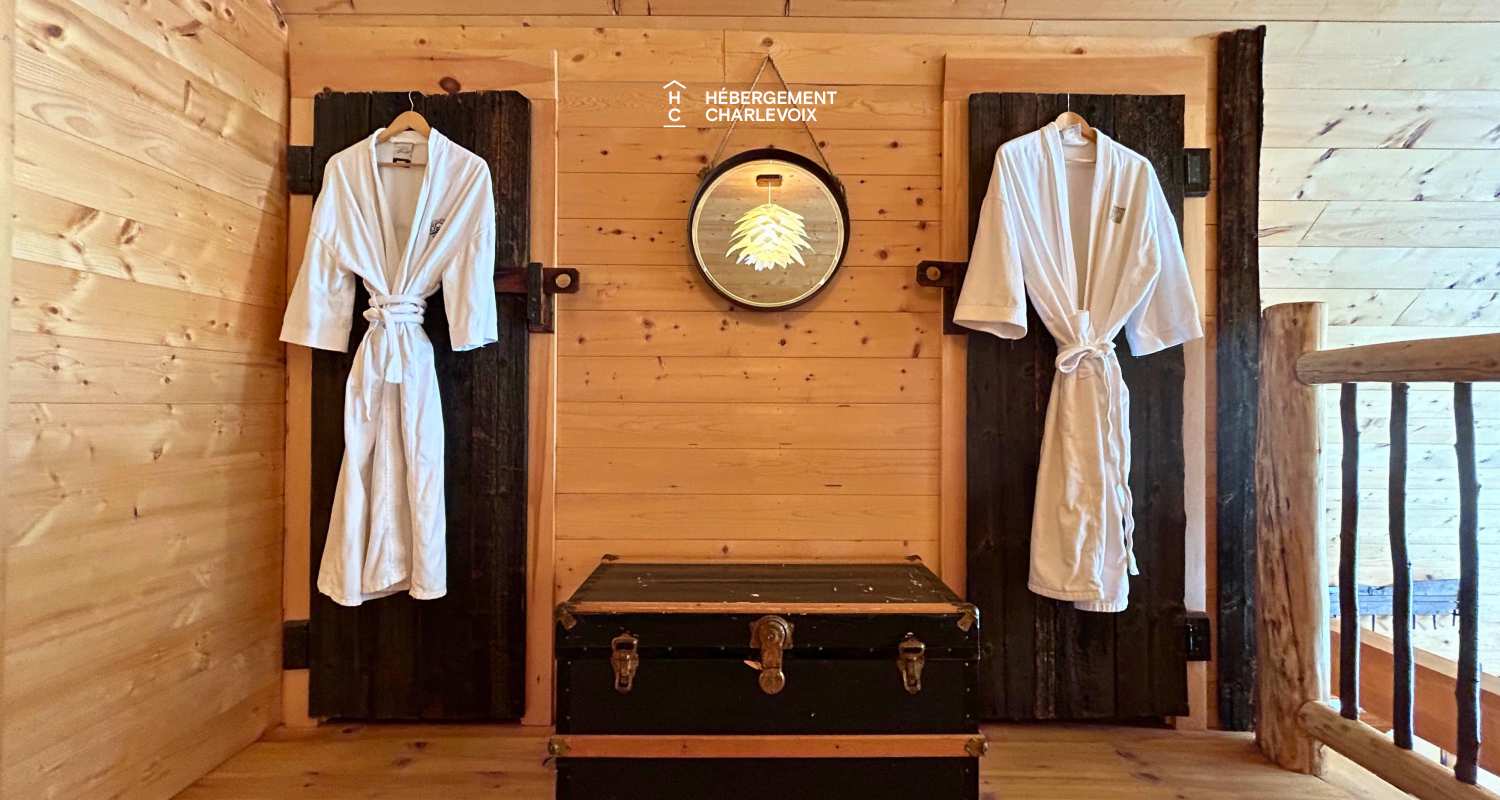 CAB-20 - Très grand chalet en demi-bois rond au coeur de la forêt canadienne.