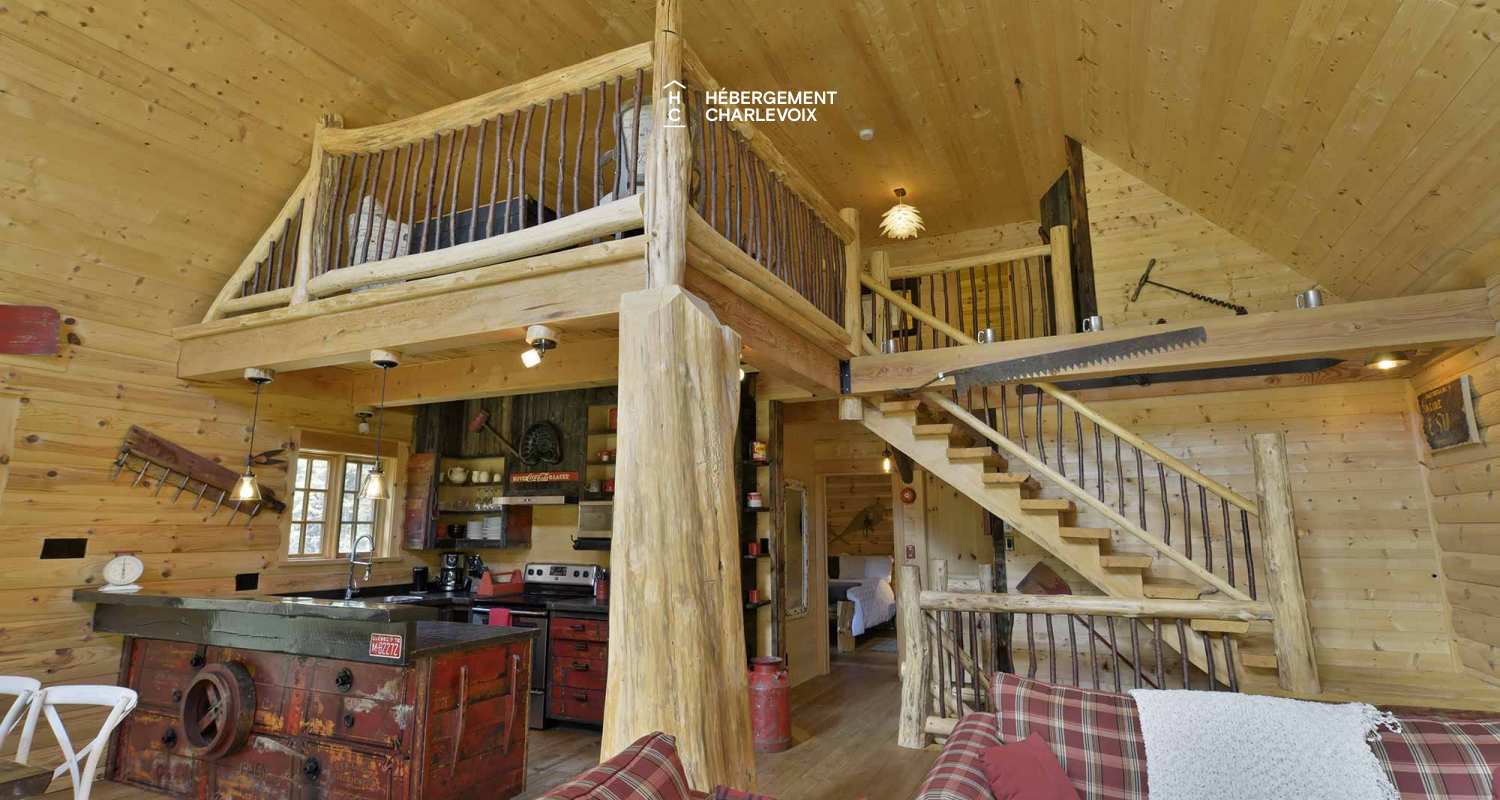 CAB-20 - Très grand chalet en demi-bois rond au coeur de la forêt canadienne.