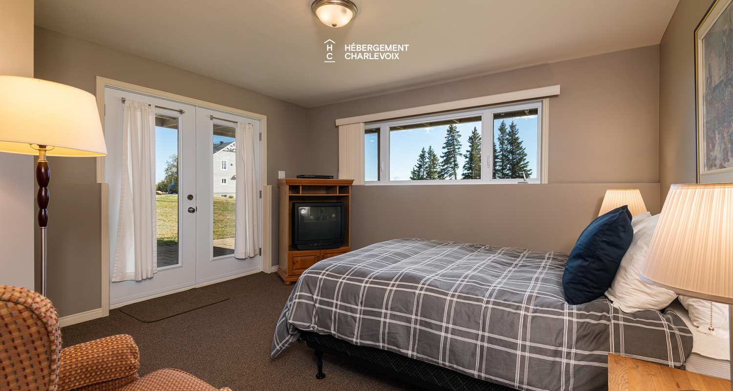 CIN-57-1 - Grand chalet avec 2 unités confortables avec vue sur le fleuve!