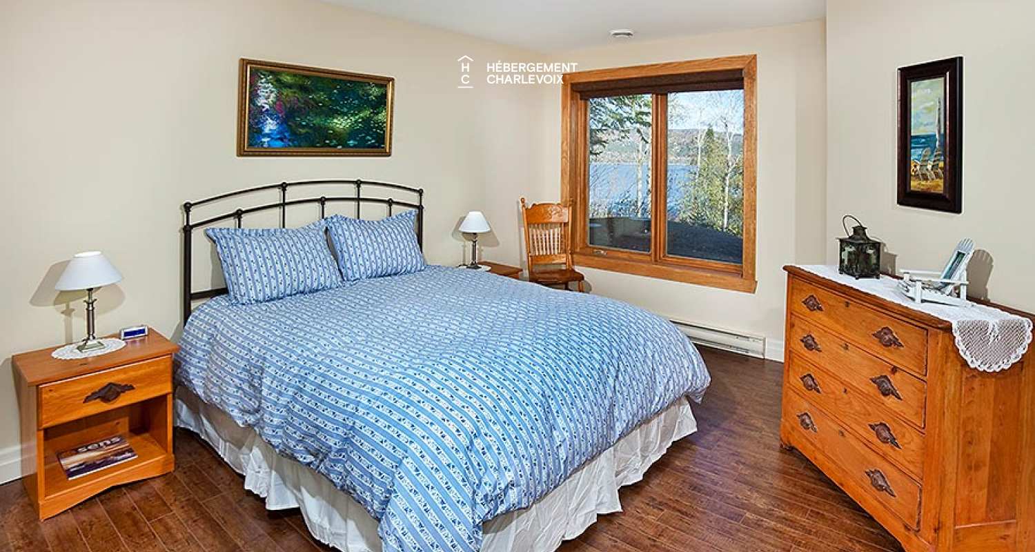 ECH-249 - De grandes fenêtres donnant sur la rive