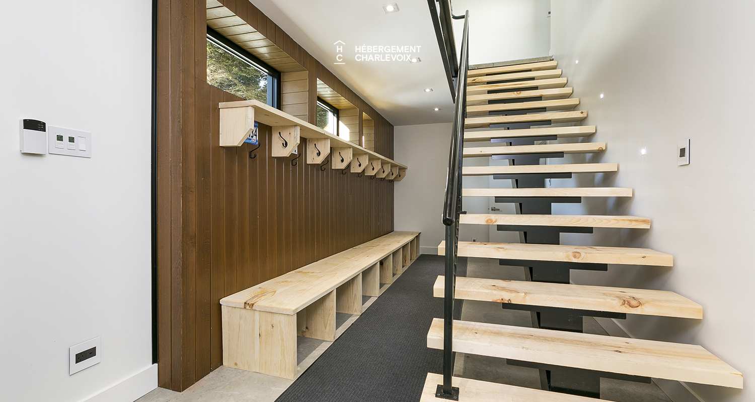 ABS-595 - Un feu de foyer suspendu dans un chalet de luxe à louer dans Charlevoix.