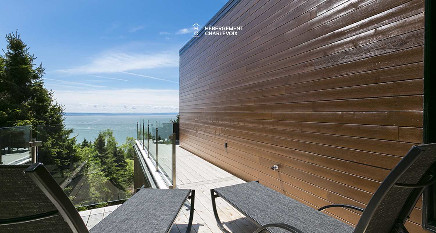 ABS-595 - Un feu de foyer suspendu dans un chalet de luxe à louer dans Charlevoix.